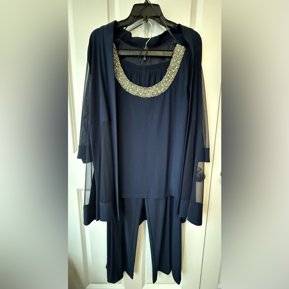 R & M Richards 3-piece navy pants suit.